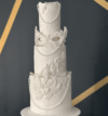 attachment-https://shop.thecakeatelier.ca/wp-content/uploads/2024/12/white-wedding-cake-100x107.png